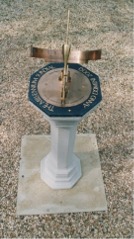 Slate ring encompassing a brass equatorial dial
