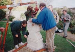 Son-in-law helping to install the Christ Church dial alongside estate staff